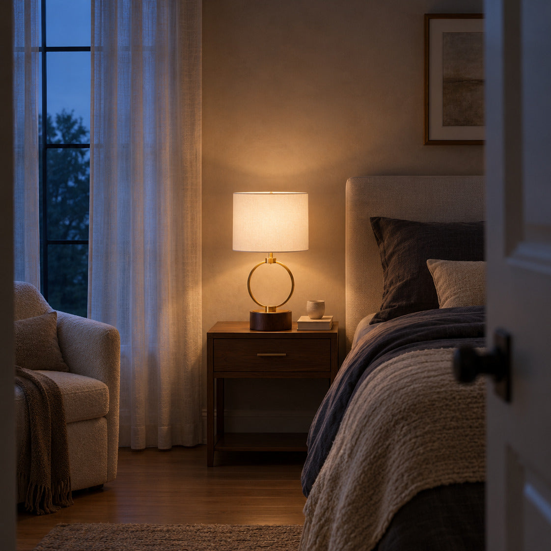 Brass Ring Table Lamp, in a bedroom at dusk