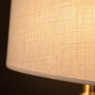 Brass Ring Table Lamp, close-up of the glowing linen shade
