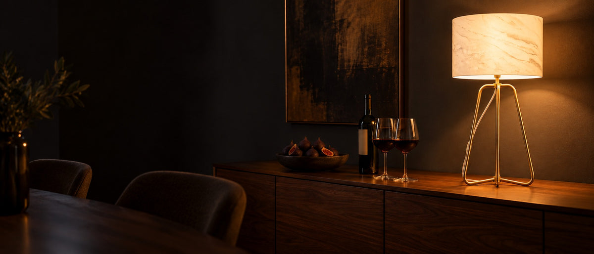 Marble-Look Drum Table Lamp, switched on in a room at night